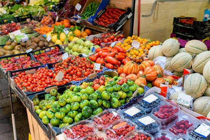 Local market visit and private cooking class at a Cesarina's home in Pavia, Pavia